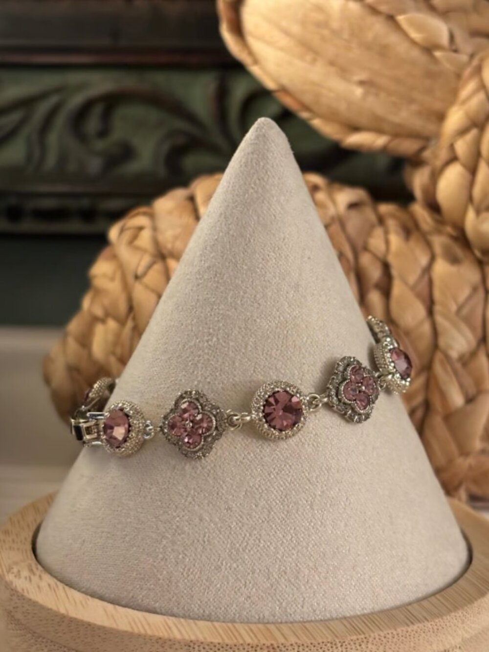 Pink colored stones and CZ on chocolate gold bracelet